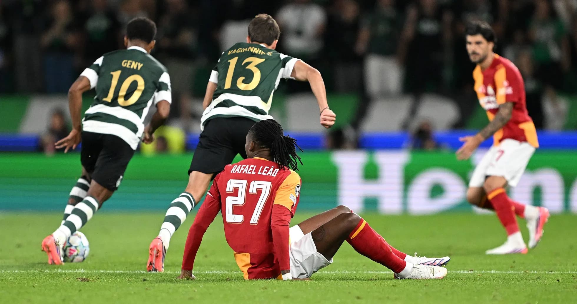 Player sitting on the pitch after a tackle