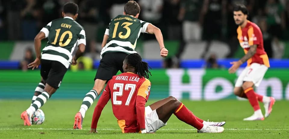 Player sitting on the pitch after a tackle