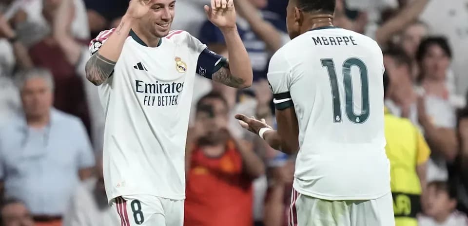 Real Madrid players celebrating a goal on the field