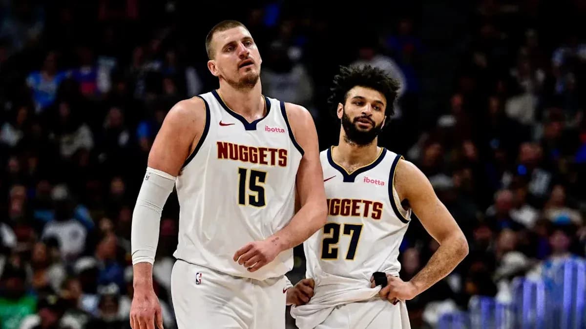 Nikola Jokić and Jamal Murray walking off court