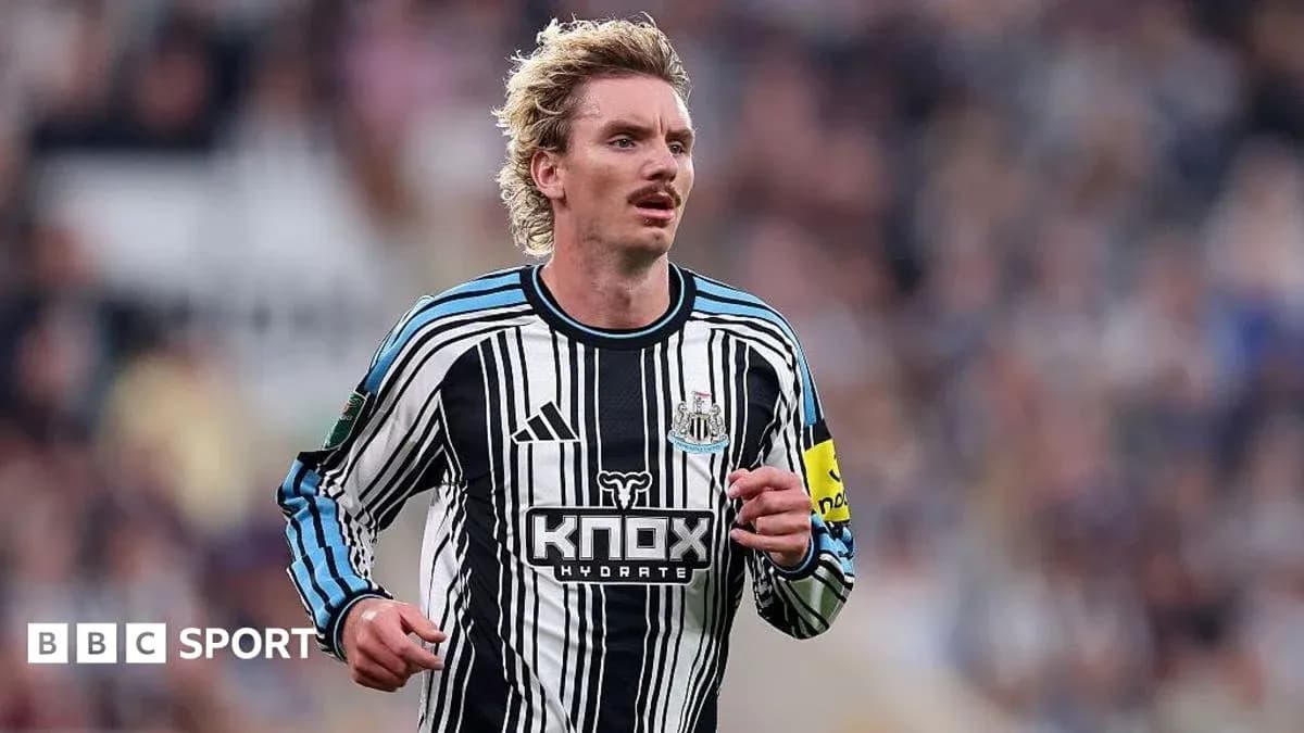 Newcastle player running during a match