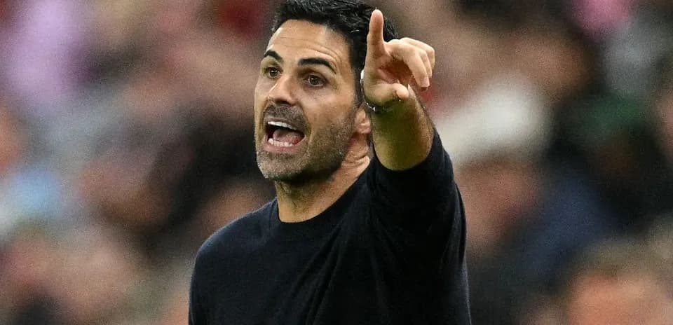 Manager directing players during a match