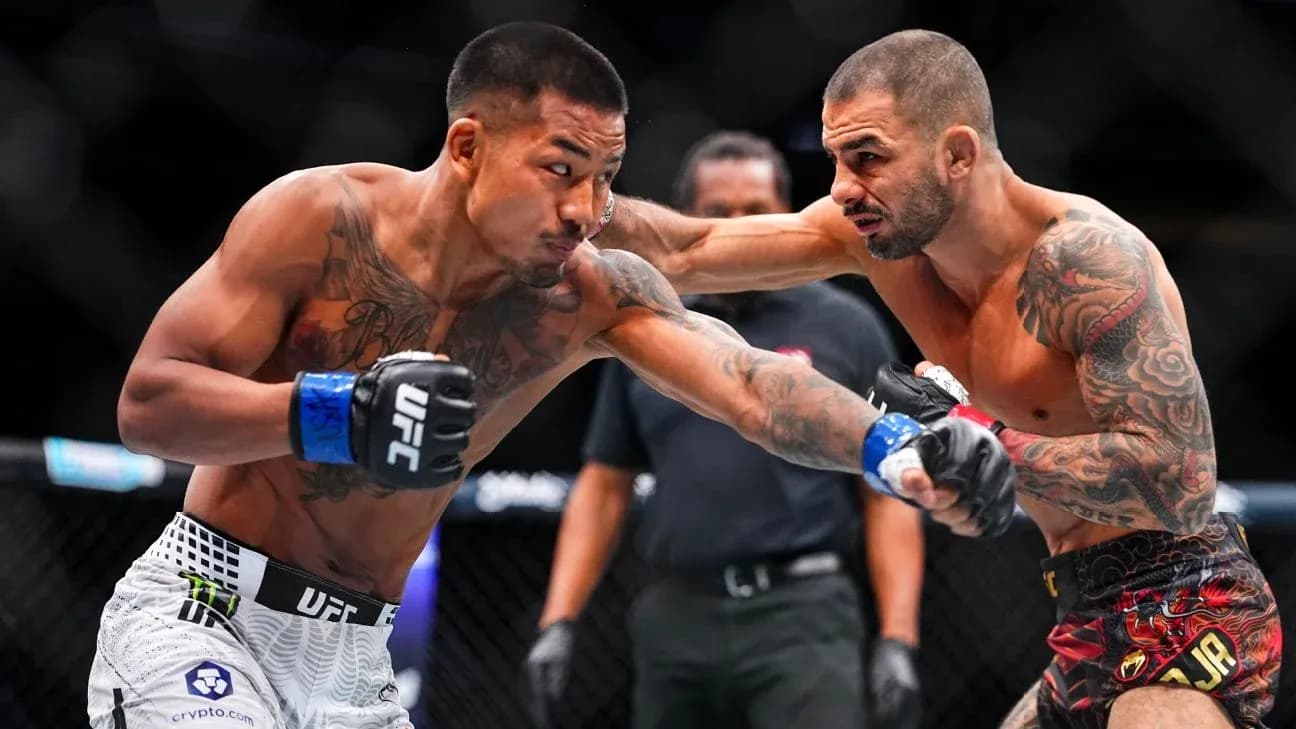 Two fighters exchanging punches in UFC match