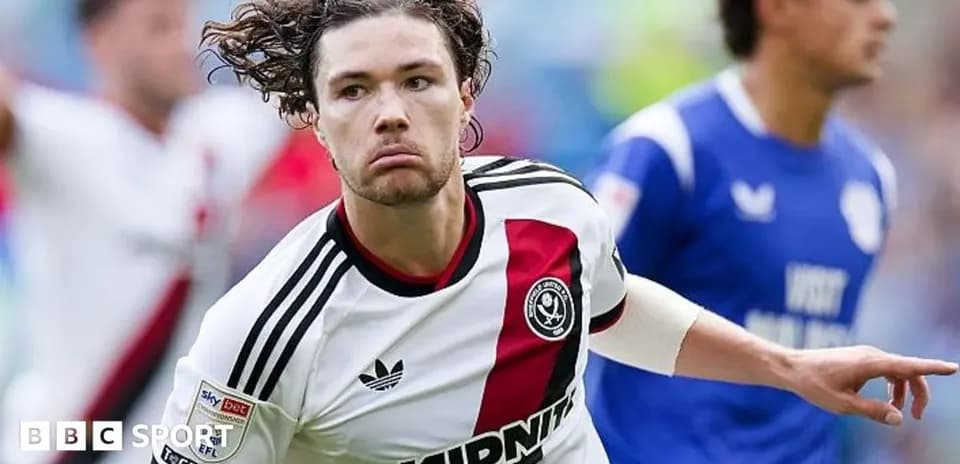 Sheffield United player celebrating a goal on pitch