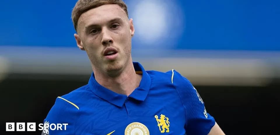 Player wearing Chelsea kit during match warm-up