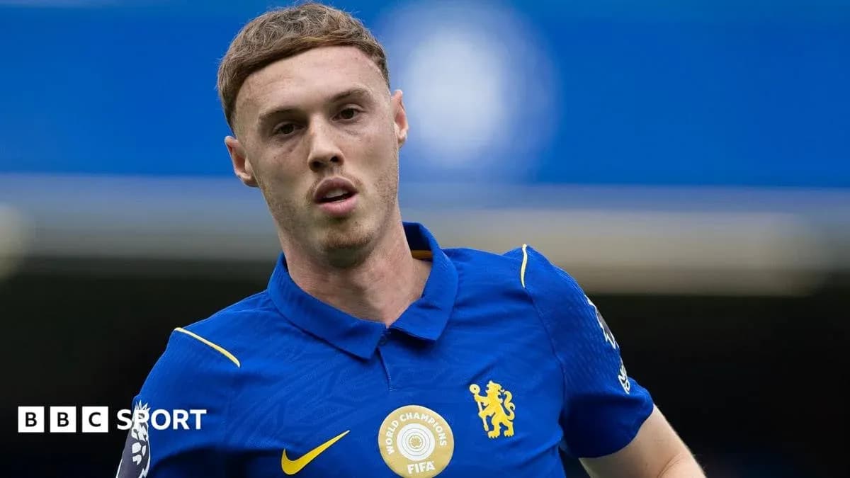Player wearing Chelsea kit during match warm-up