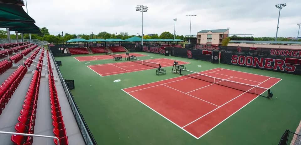 Tennis courts with seating at Oklahoma facility