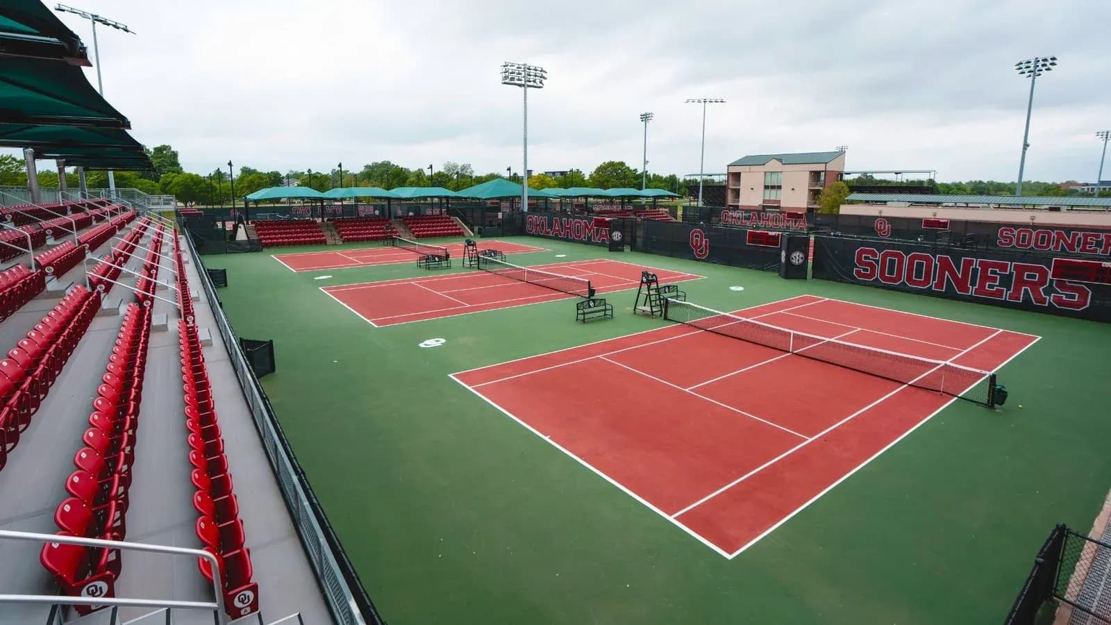 Tennis courts with seating at Oklahoma facility