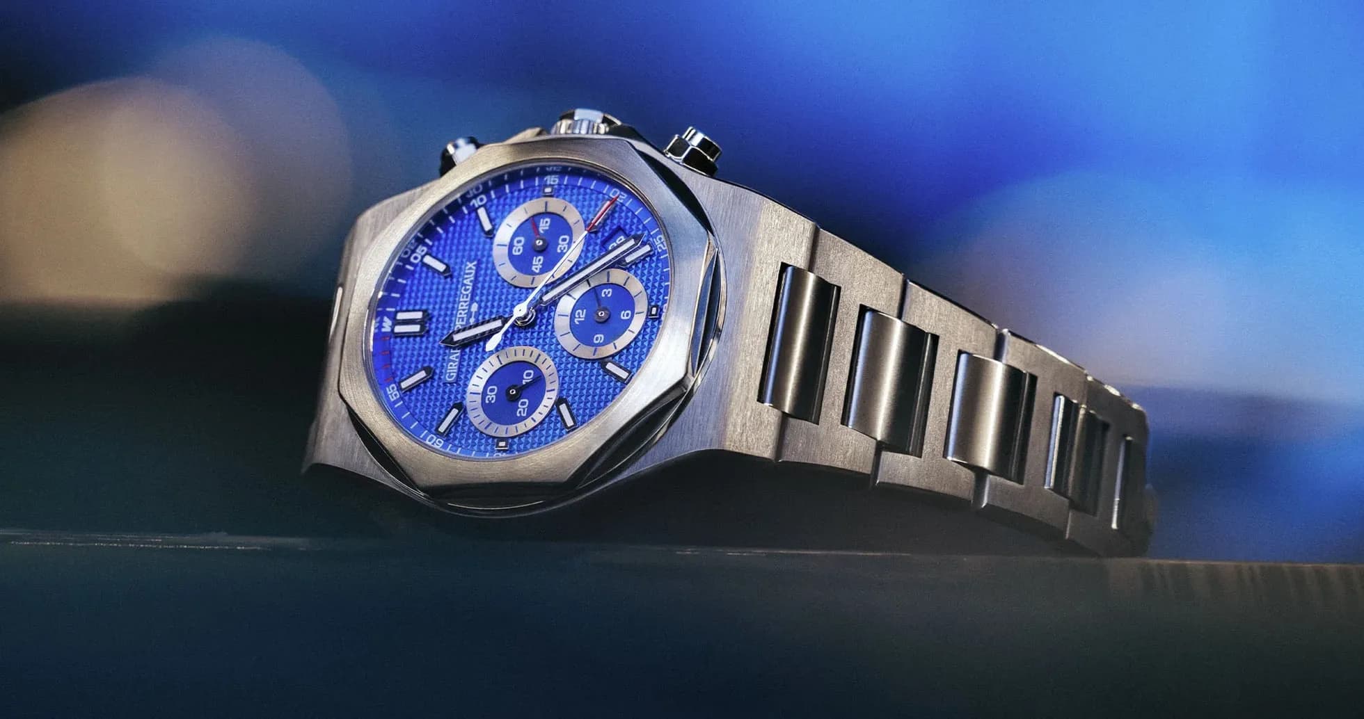 Luxury watch with blue dial and steel bracelet