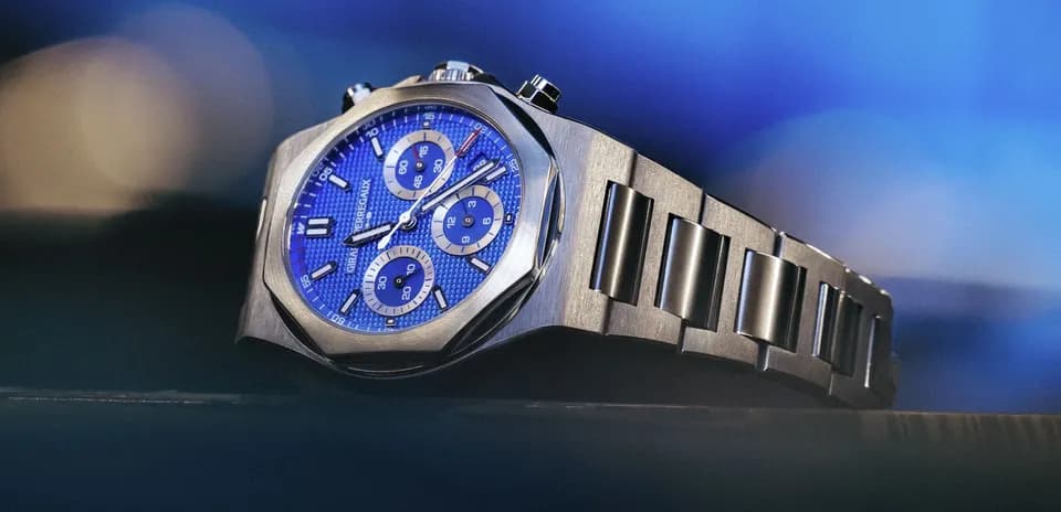 Luxury watch with blue dial and steel bracelet