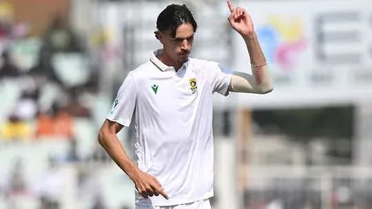 Cricketer celebrating a wicket during a match