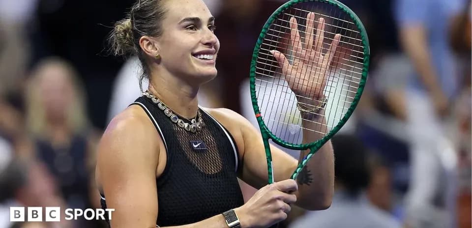 Tennis player waving with racket after match