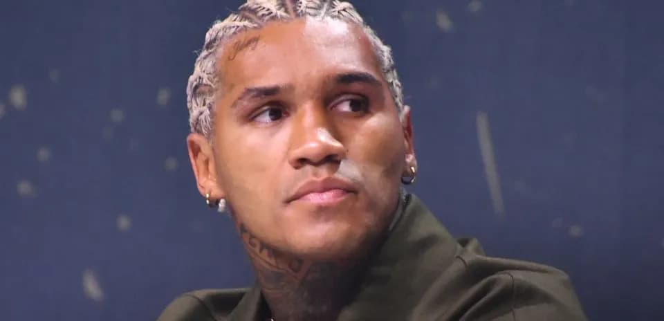Athlete with braided hair during press event