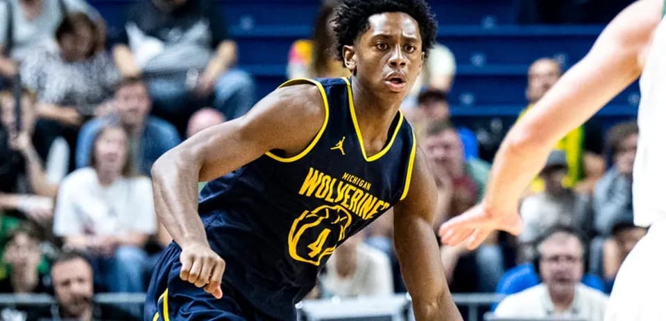 Player in Michigan Wolverines jersey during game