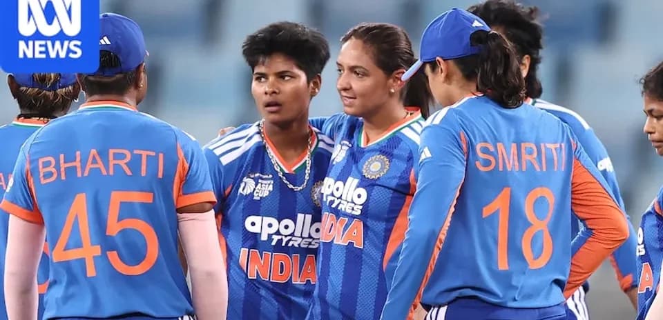 Indian women's cricket team in a huddle during match