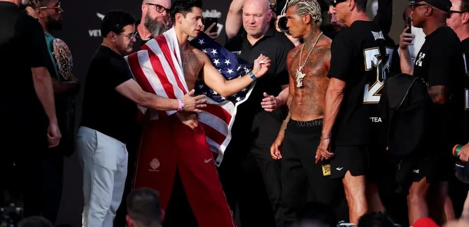 Boxers facing off at pre-fight weigh-in event