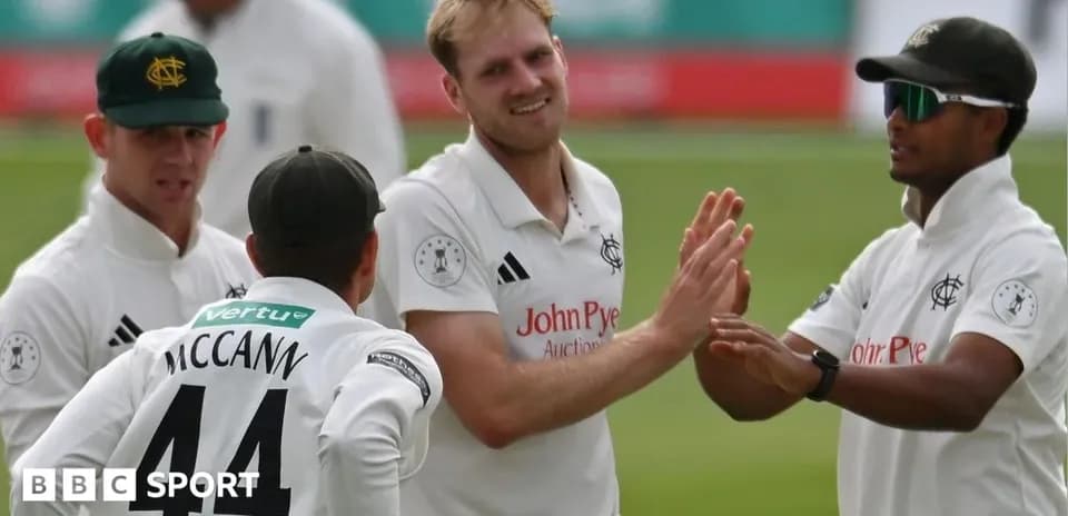 Players celebrating a wicket during cricket match