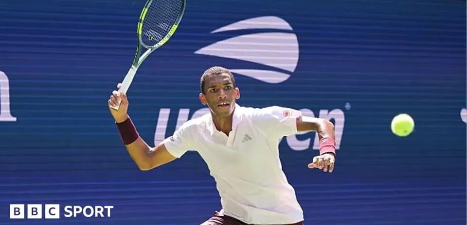 Player hitting a forehand during tennis match