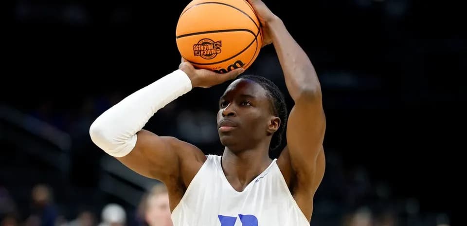 Player preparing to shoot basketball during practice