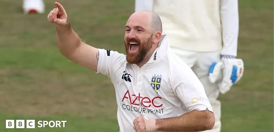 Cricketer celebrating a wicket during a match