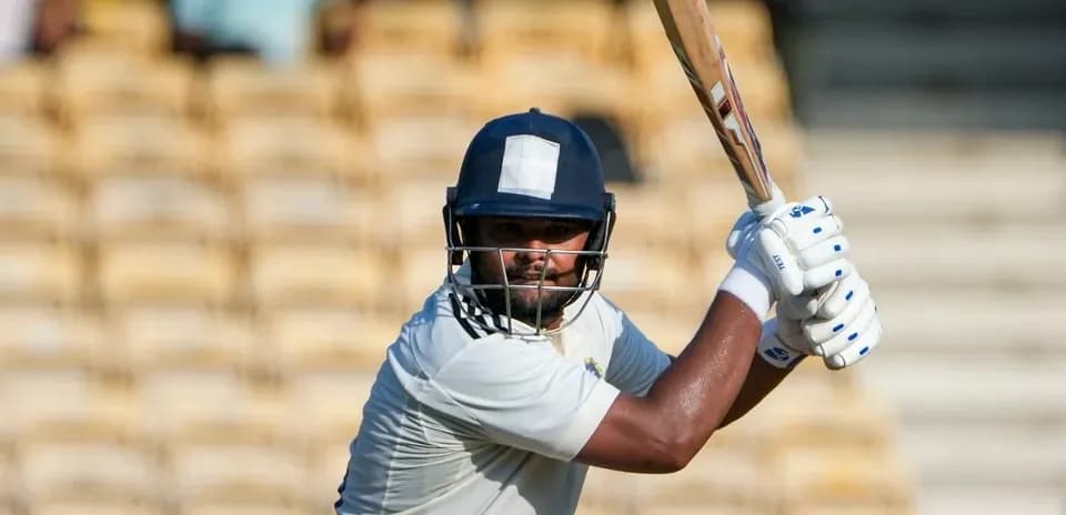 Batter preparing to hit the ball on cricket field