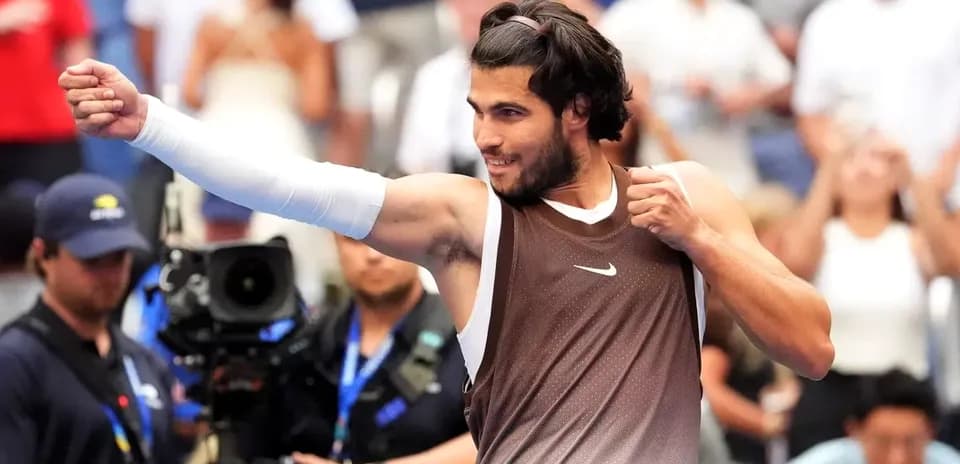 Player celebrating victory with raised fist