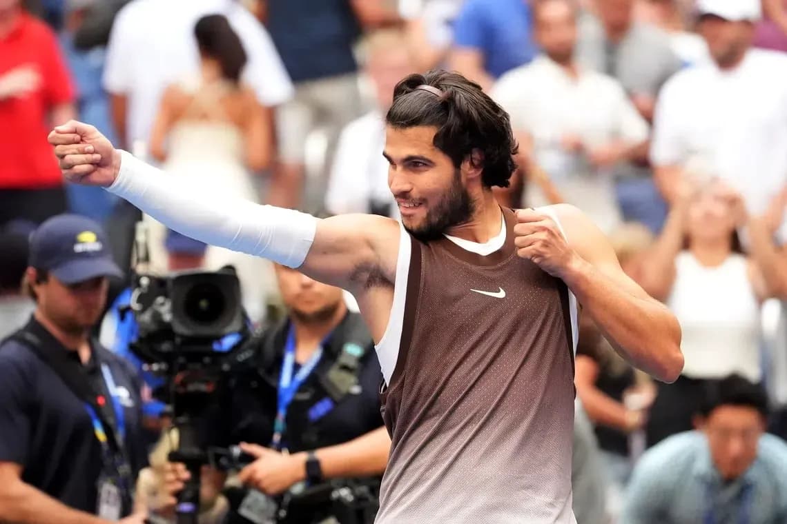 Player celebrating victory with raised fist