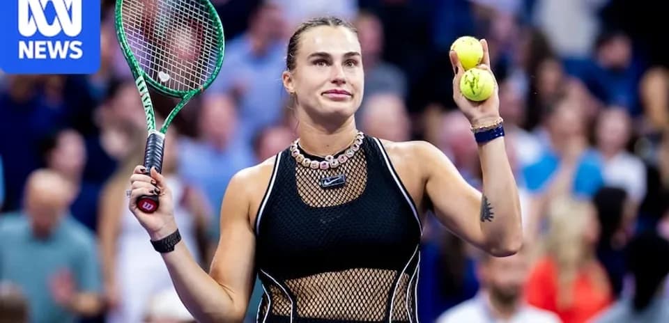 Player holding tennis balls with racket in hand