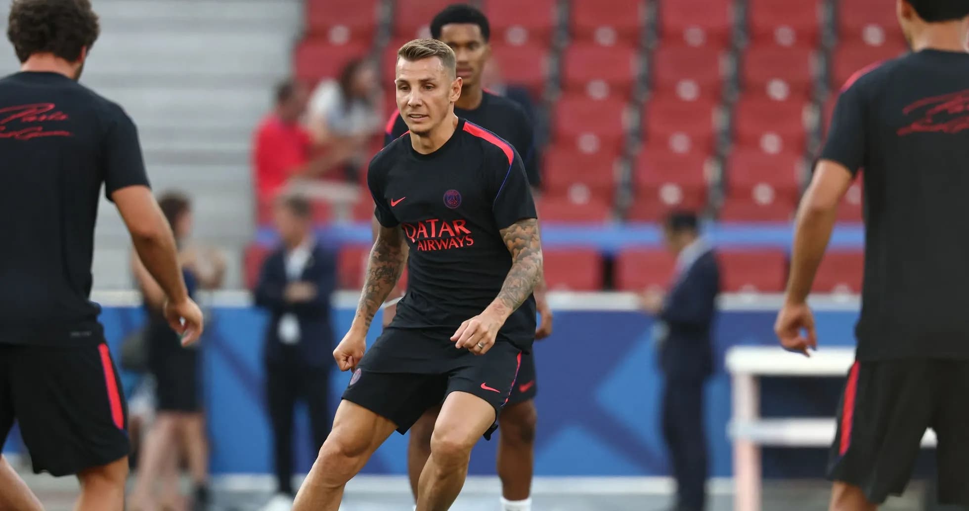 Player training on the pitch during warm-up session