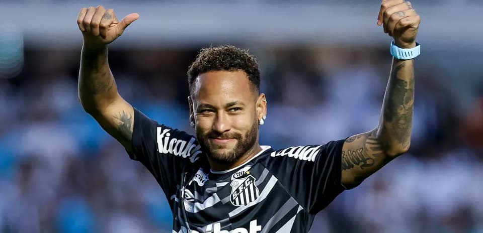 Neymar celebrating in Santos FC jersey during match