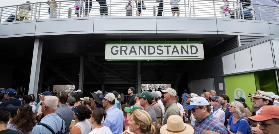 Crowd waiting at the Grandstand entrance