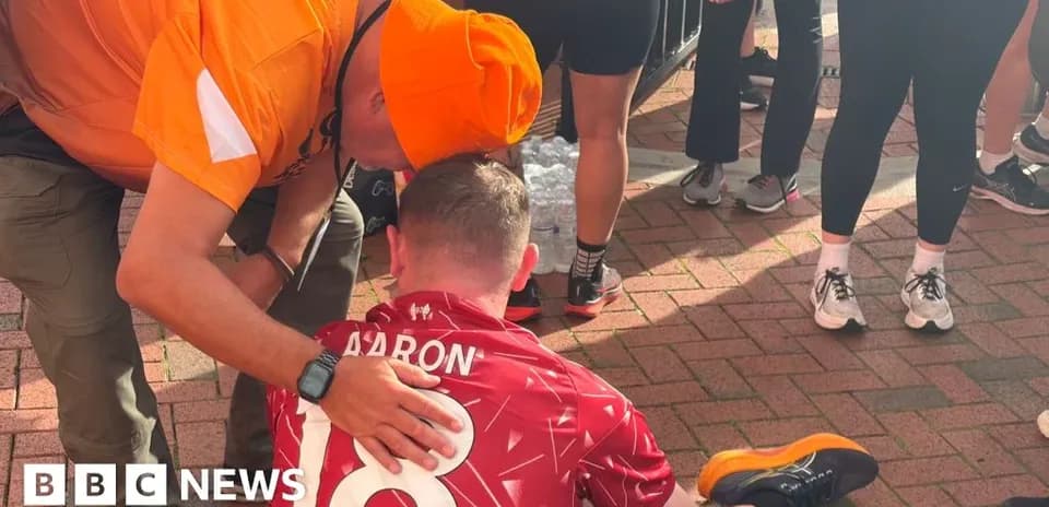 Runner receiving assistance after completing the race