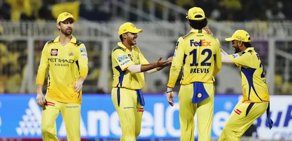 Chennai Super Kings players celebrating on the field