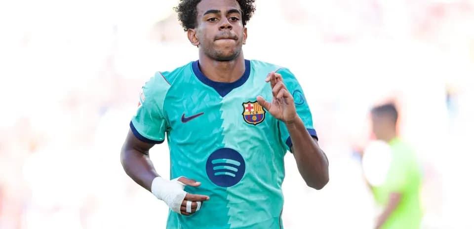 Player celebrating after scoring a goal for Barcelona