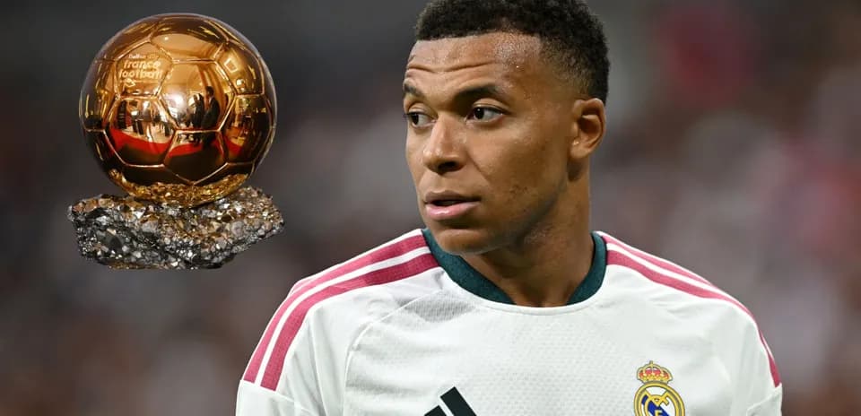 Kylian Mbappé with Ballon d'Or trophy