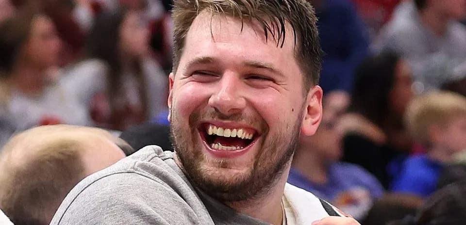 Player laughing on the bench during game