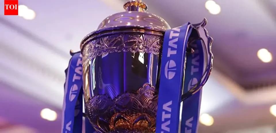 Close-up of a trophy with blue ribbons