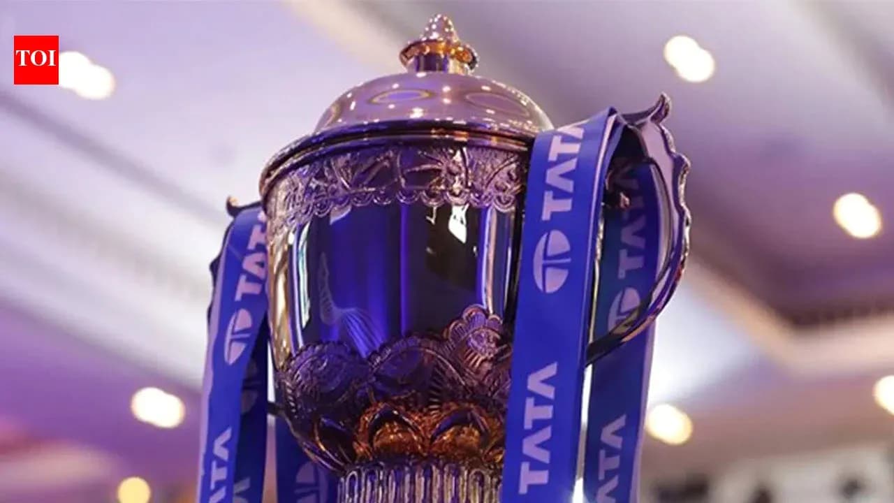 Close-up of a trophy with blue ribbons