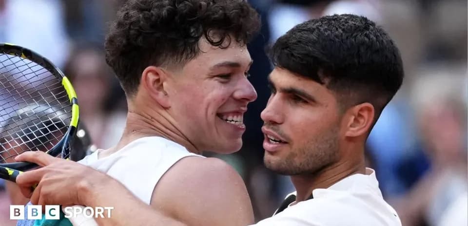 Two tennis players embracing on the court