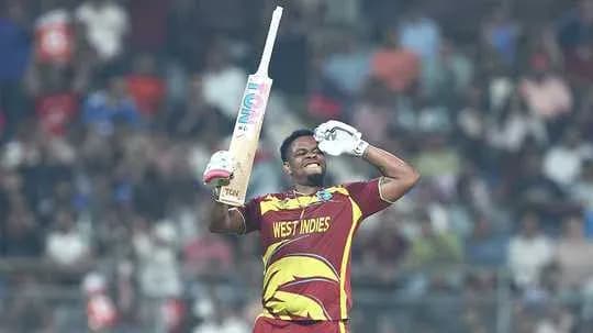 Cricketer celebrating after scoring a century