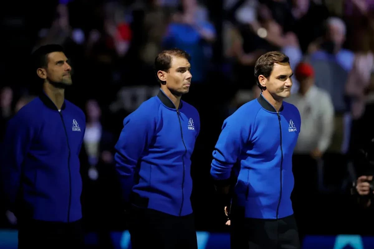 Three tennis players standing together on stage