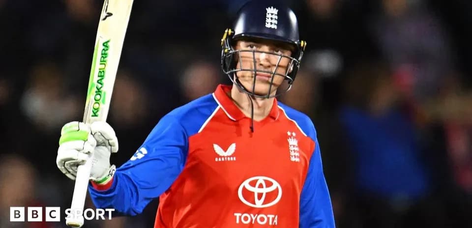 Cricketer celebrating with bat during match
