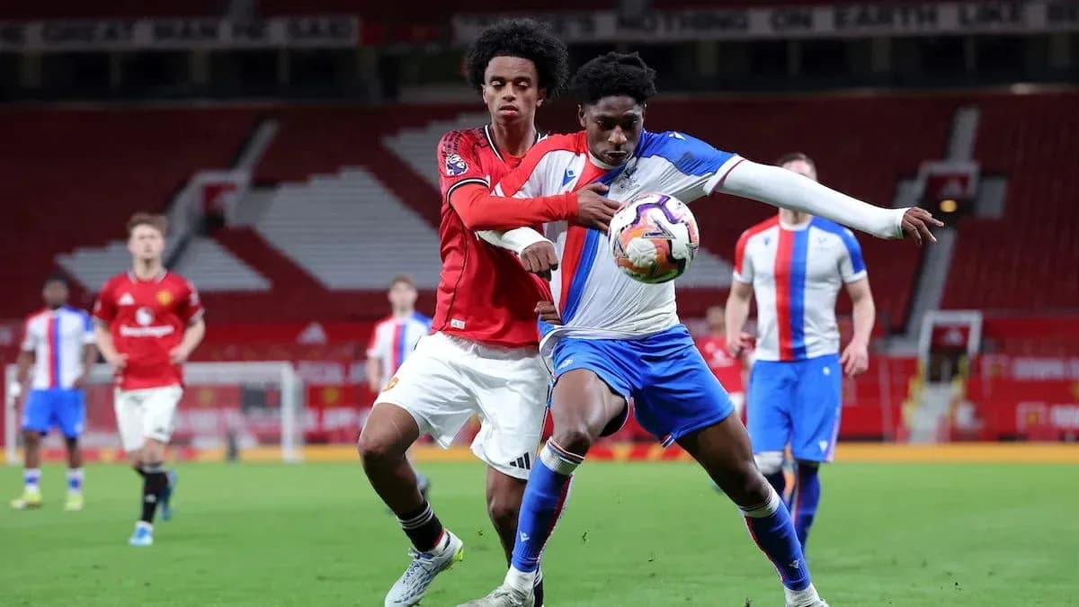 Two players battling for the ball during match