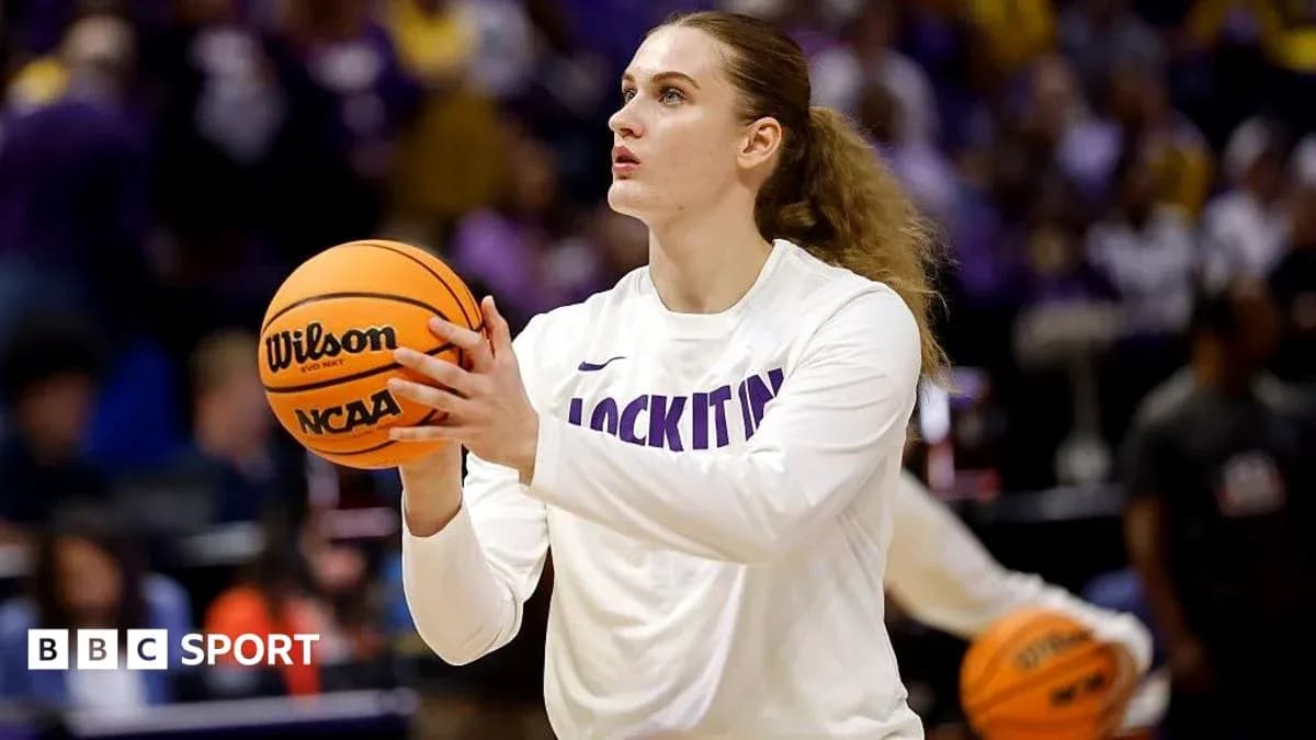 Player warming up with basketball before game
