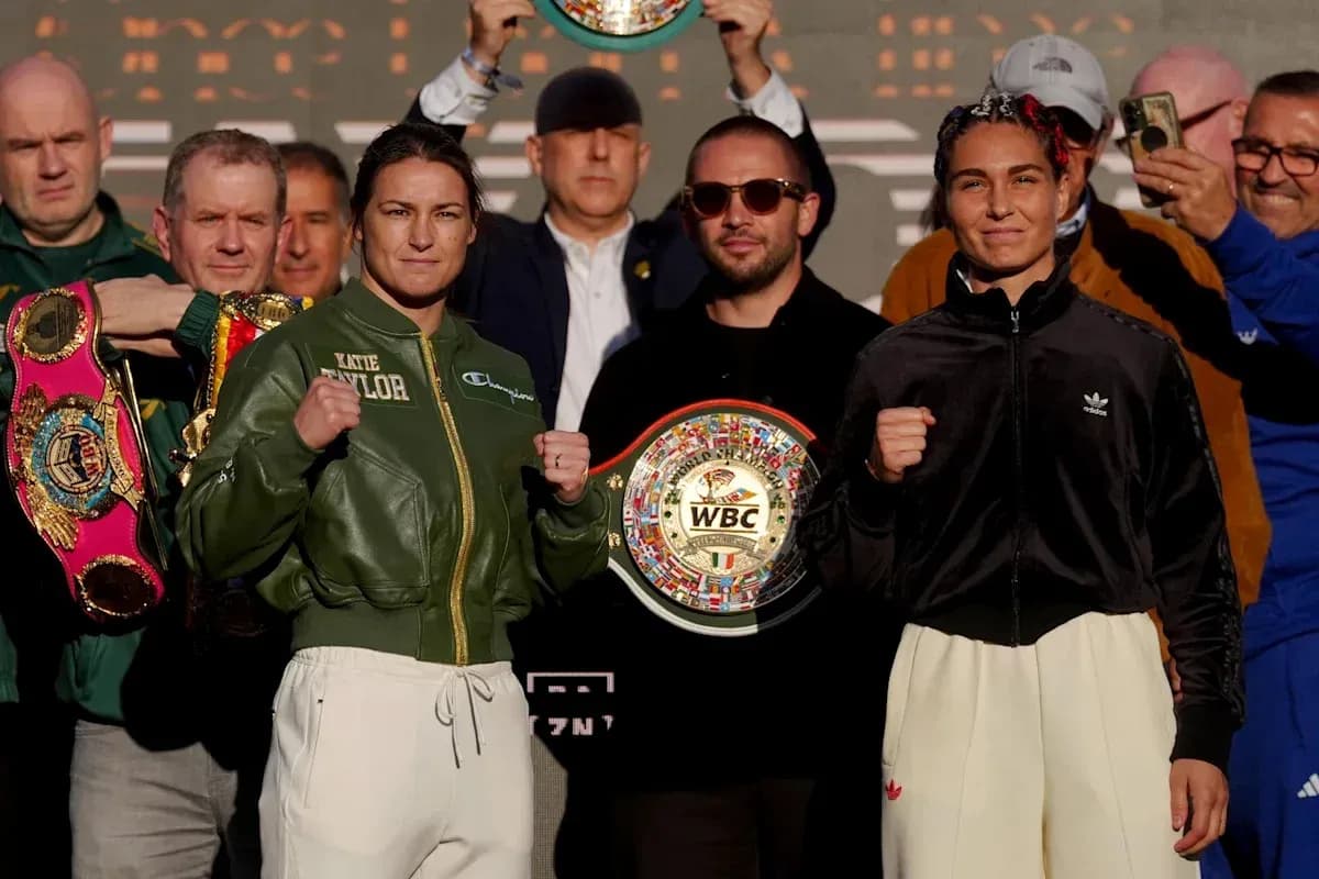 Katie Taylor and opponent at boxing weigh-in event