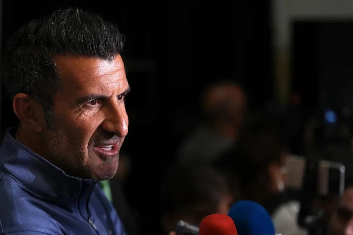 Man speaking at press conference with microphones