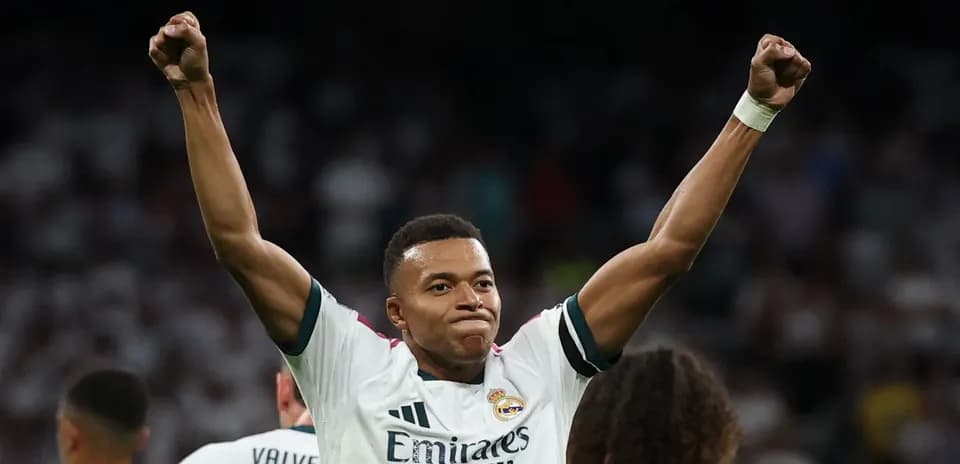 Player celebrating after scoring a goal for Real Madrid