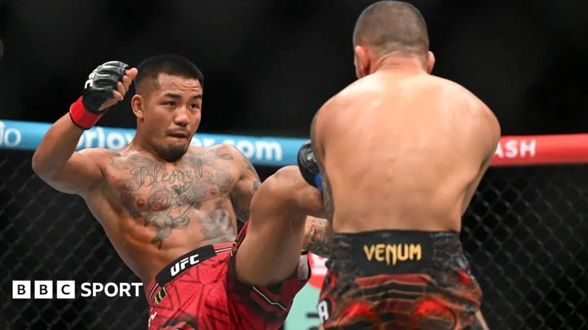 Fighter delivering a kick during UFC match
