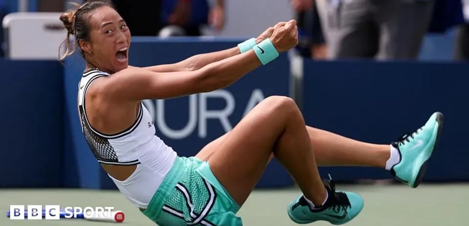 Tennis player celebrating on court after winning