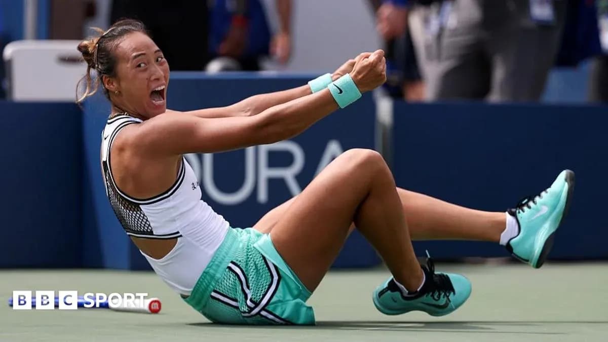 Tennis player celebrating on court after winning